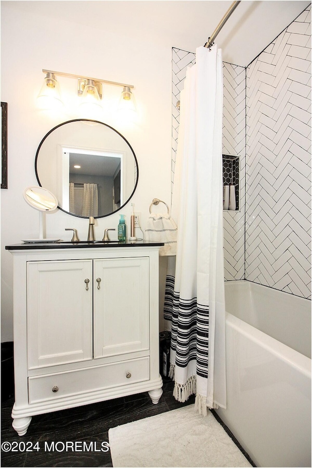 bathroom with vanity and shower / bath combo