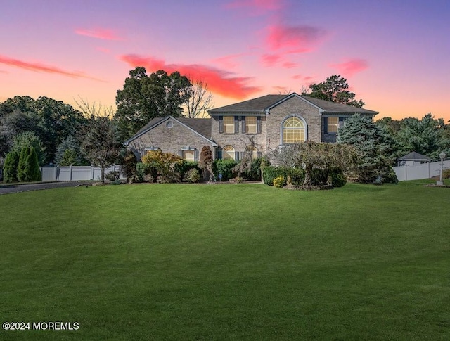 view of front of home featuring a yard