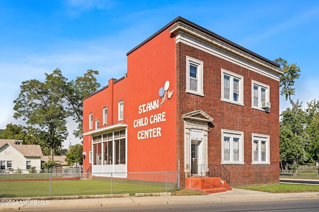 view of building exterior featuring cooling unit