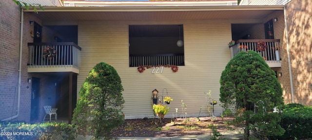 view of home's exterior featuring a balcony