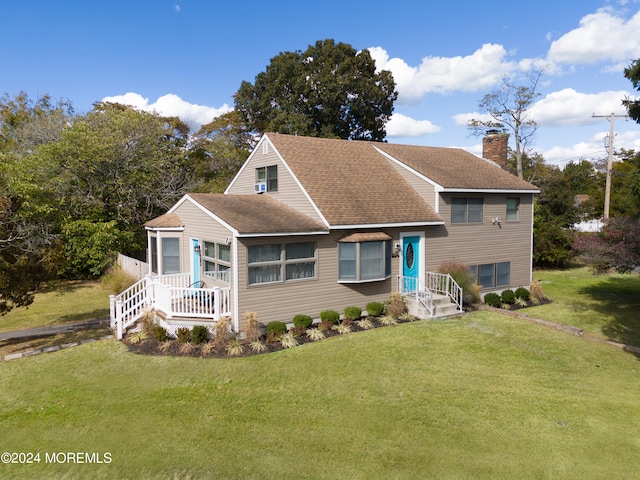 view of front of property with a front lawn