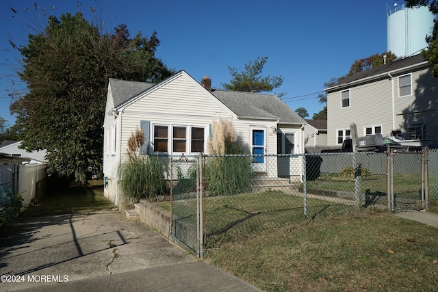 view of front of home with a front yard