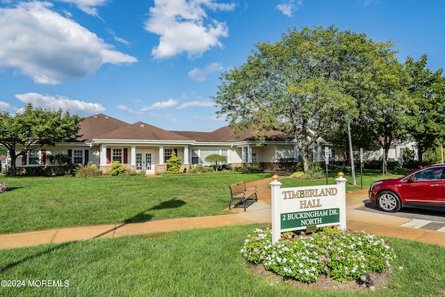 exterior space featuring a front lawn