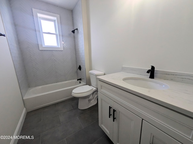 full bathroom featuring vanity, toilet, tile patterned floors, and tiled shower / bath combo