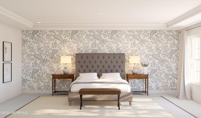 living area featuring crown molding and a tray ceiling