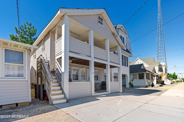 119 1st Ave, Manasquan, NJ 08736 - view of front of house featuring a balcony