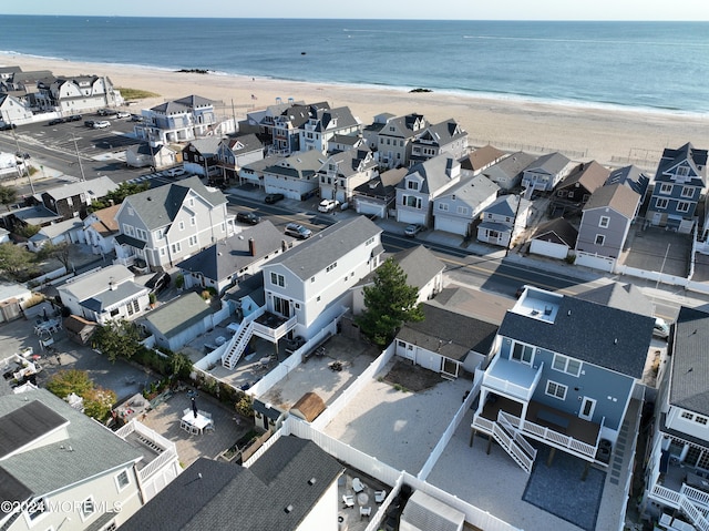 aerial view featuring a water view and a view of the beach