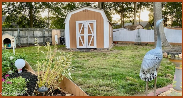 view of outdoor structure featuring a lawn