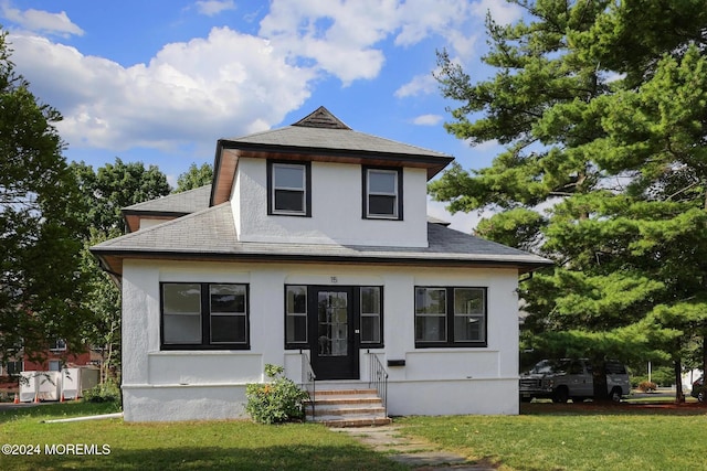 view of front of home featuring a front yard