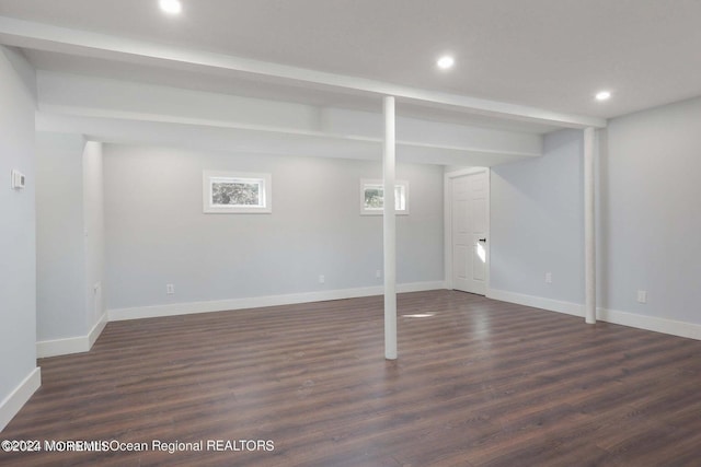 basement featuring dark wood-type flooring