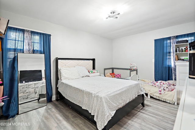 bedroom featuring hardwood / wood-style floors