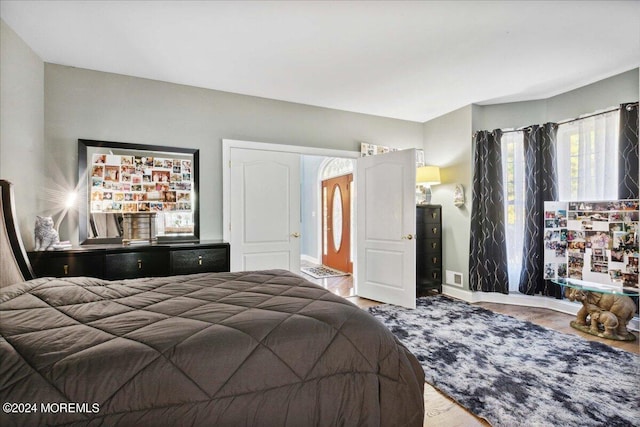 bedroom featuring wood-type flooring