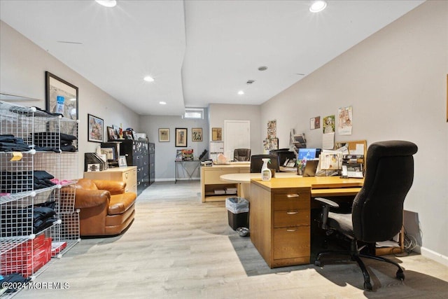 office area with light hardwood / wood-style flooring