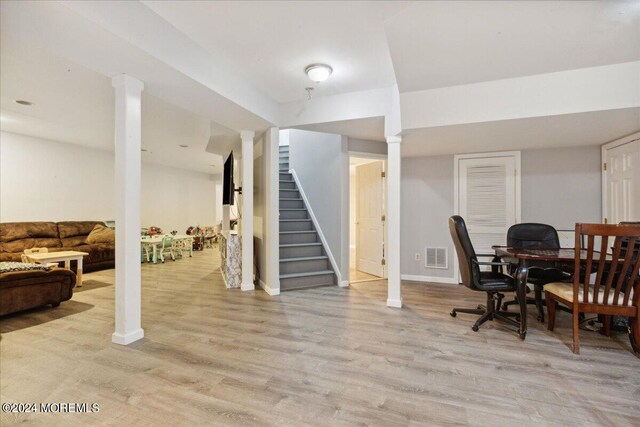 office space with light hardwood / wood-style flooring