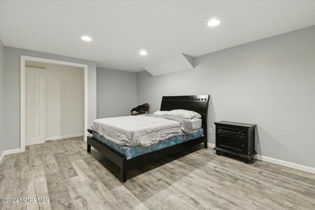 bedroom with light wood-type flooring