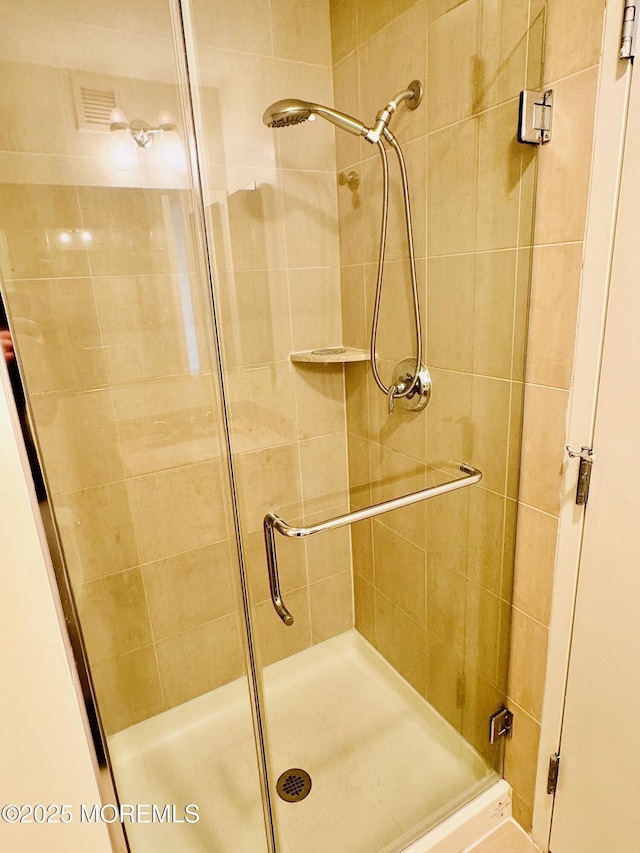 full bath featuring a stall shower