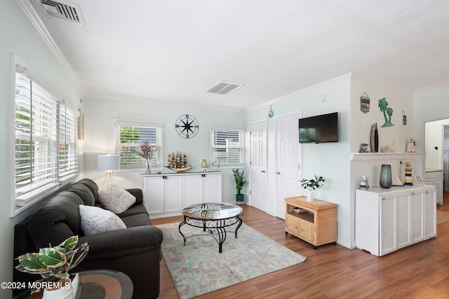 304 Bay Blvd, Seaside Heights, NJ 08751 - living room featuring wood finished floors and ornamental molding