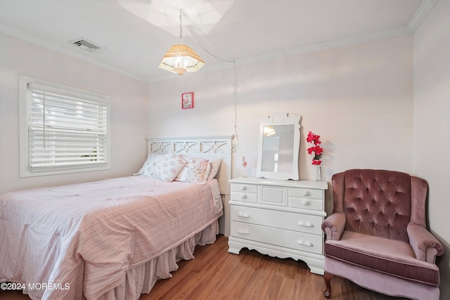 304 Bay Blvd, Seaside Heights, NJ 08751 - bedroom with crown molding and light wood finished floors