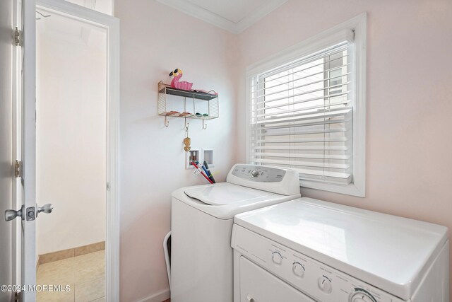 304 Bay Blvd, Seaside Heights, NJ 08751 - laundry room with washer and dryer, ornamental molding, and baseboards