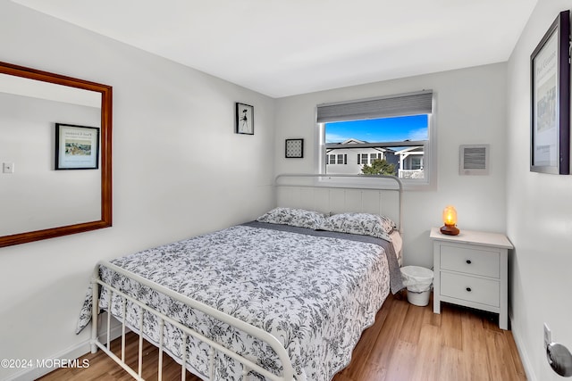 bedroom featuring light wood-type flooring