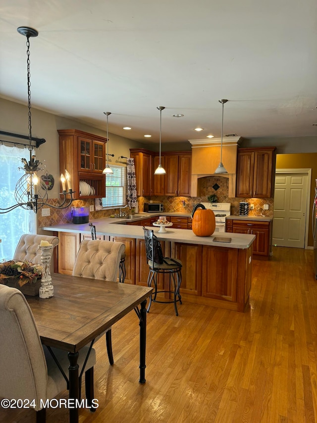 dining area with light wood-type flooring