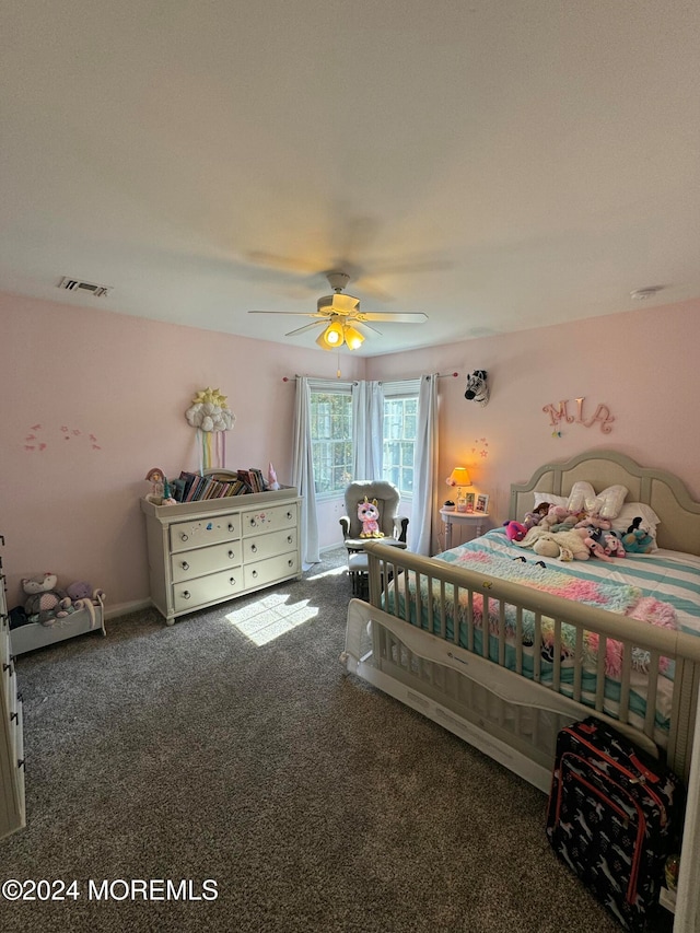 carpeted bedroom with ceiling fan