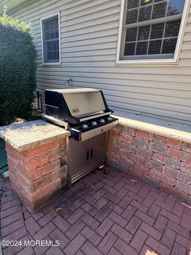 view of patio / terrace with a grill and an outdoor kitchen