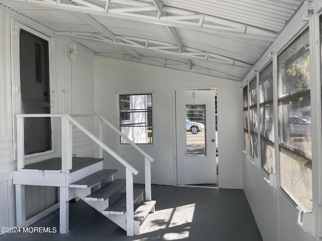 interior space featuring lofted ceiling