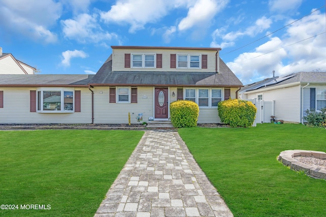 view of front of property with a front lawn