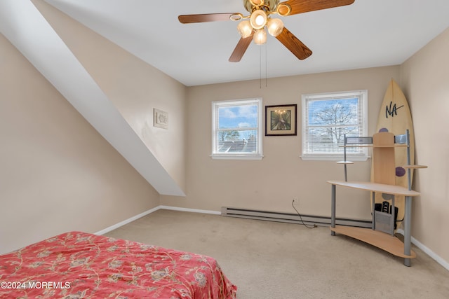 carpeted bedroom featuring a baseboard radiator and ceiling fan