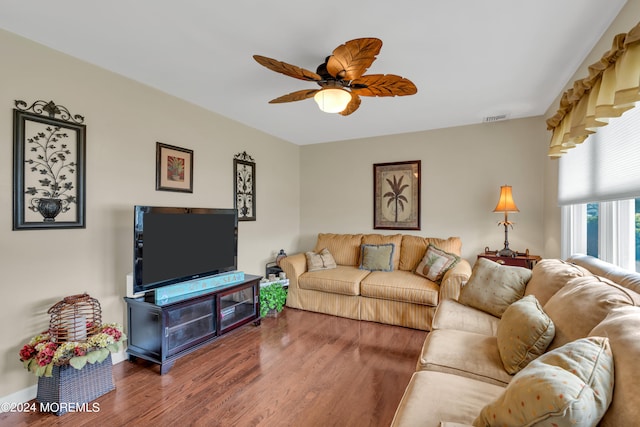 living room with ceiling fan and hardwood / wood-style floors