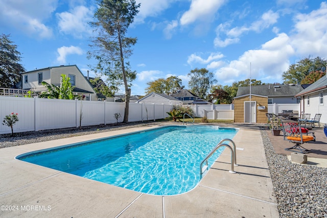 view of pool featuring a patio area