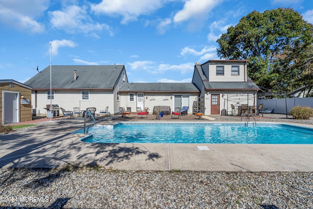 view of pool featuring a patio