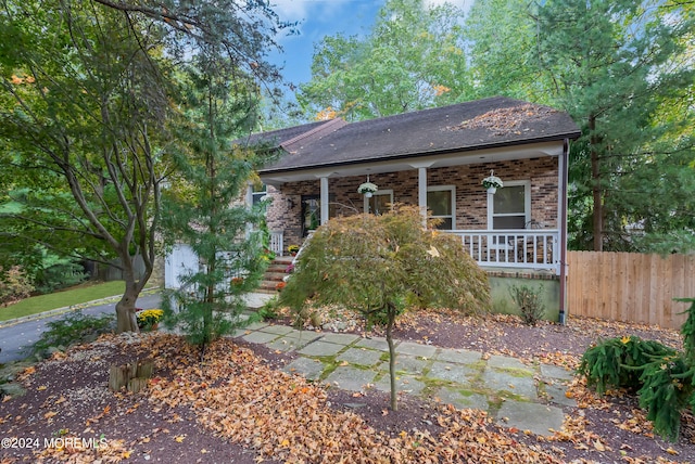 view of front of property featuring covered porch