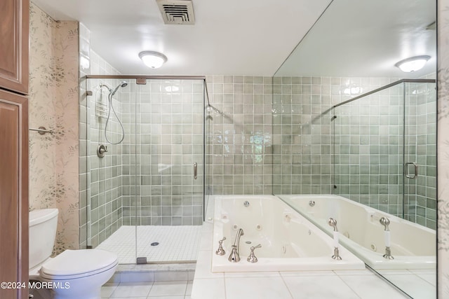 bathroom with toilet, tile patterned floors, and plus walk in shower