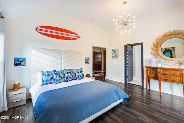 bedroom featuring vaulted ceiling, a chandelier, and dark wood-type flooring