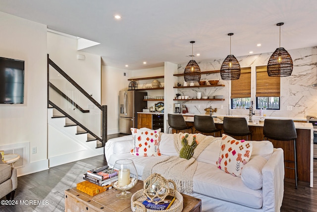 living room with dark hardwood / wood-style floors