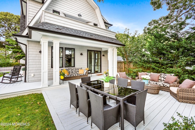 wooden deck with outdoor lounge area