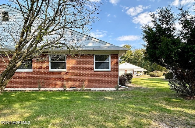 259 Laurel Pl Unit A, Manchester, NJ 08759 - view of side of home with a lawn and brick siding