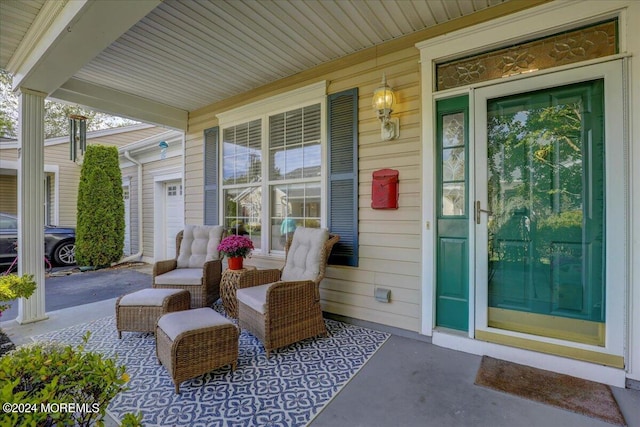 view of patio featuring a porch