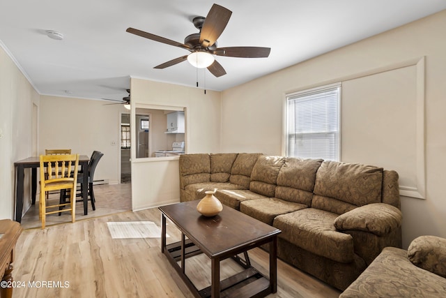 204 19th Ave, Belmar, NJ 07719 - living room featuring light wood-type flooring, a ceiling fan, a baseboard radiator, and ornamental molding