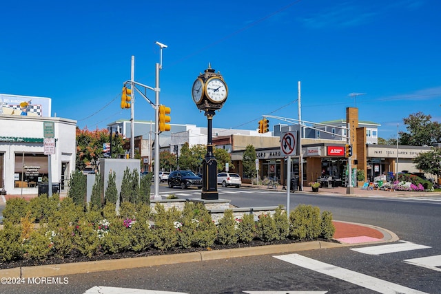 204 19th Ave, Belmar, NJ 07719 - view of asphalt street featuring traffic lights, street lighting, curbs, and sidewalks