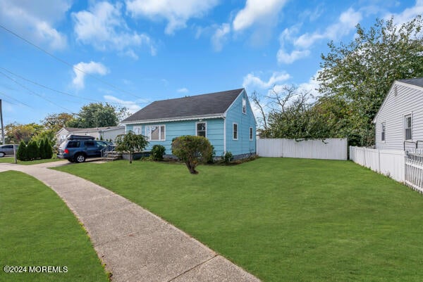 exterior space with a front lawn