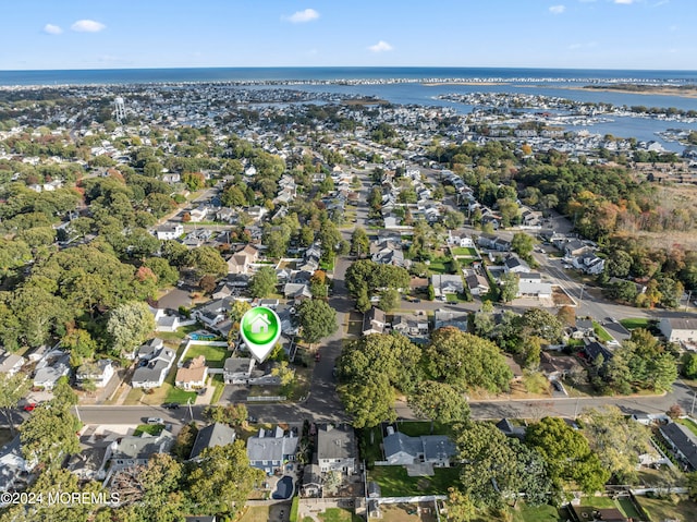 drone / aerial view featuring a water view