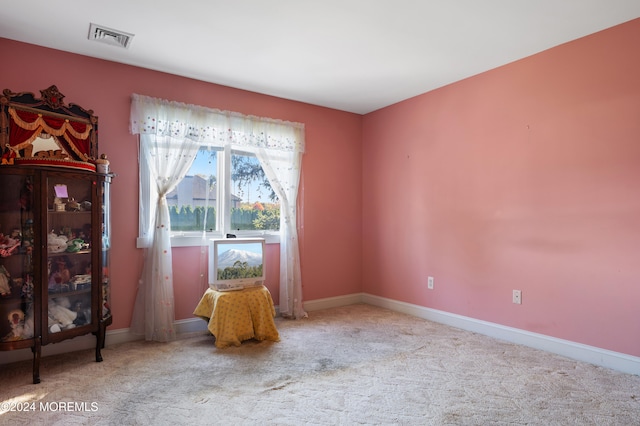 sitting room with light carpet