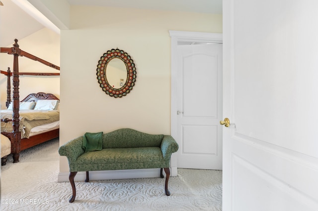 bedroom featuring light colored carpet