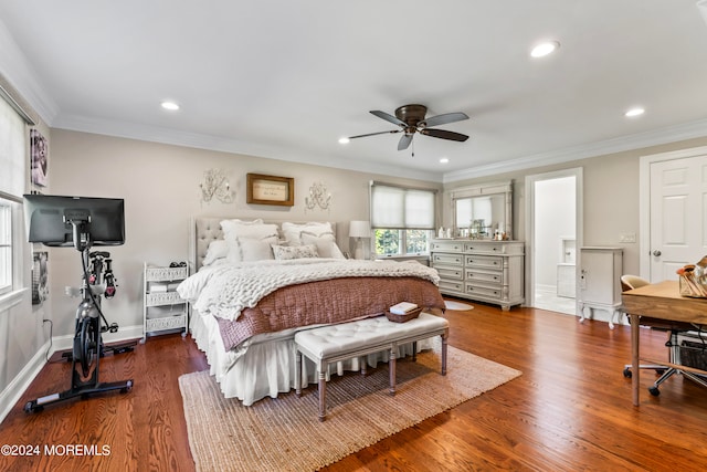 bedroom with ornamental molding, wood-type flooring, and ceiling fan