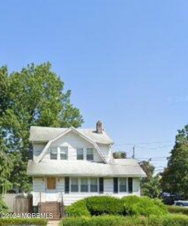 133 Degraw Ave, Teaneck, NJ 07666 - view of front of house with a chimney