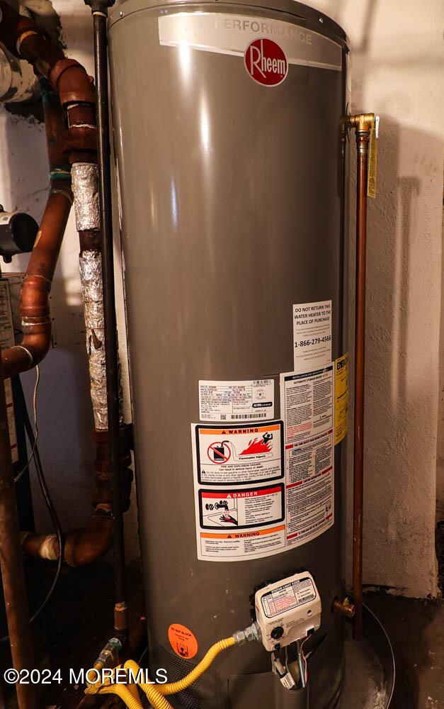 133 Degraw Ave, Teaneck, NJ 07666 - utility room featuring water heater