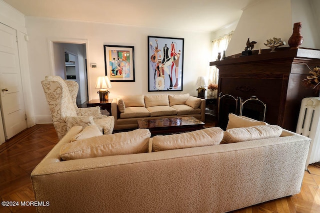 living room featuring parquet floors